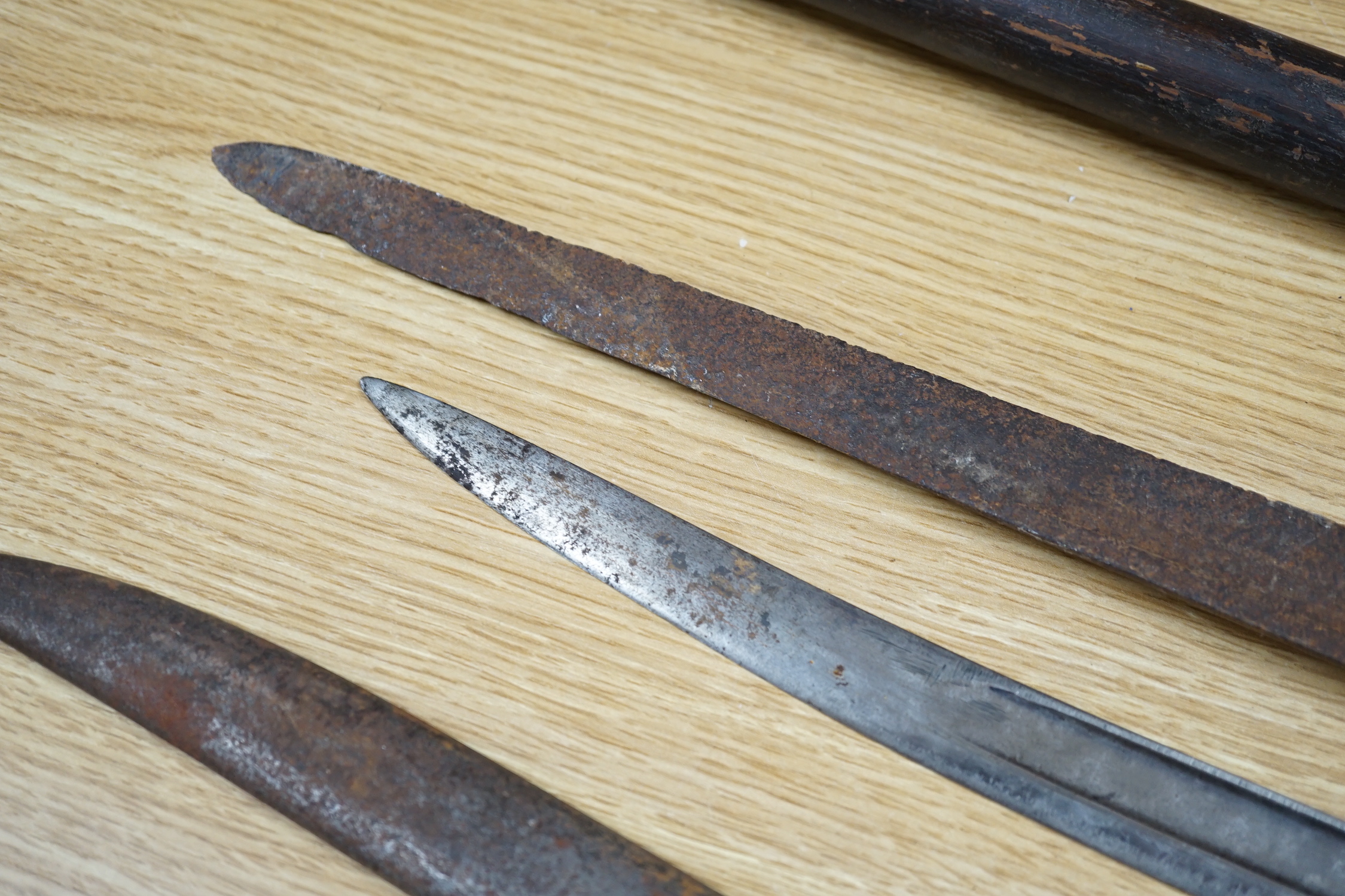 An early pike, a basket hilt sword and a French bayonet. longest 193cm